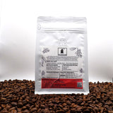 Coffee packaging with a white background and coffee beans at the bottom infusion premium Ghirardelli